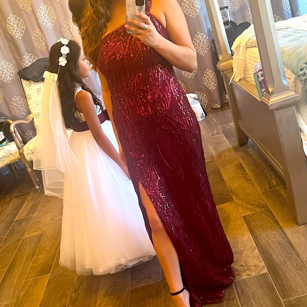 Long, maroon gown from David’s bridal